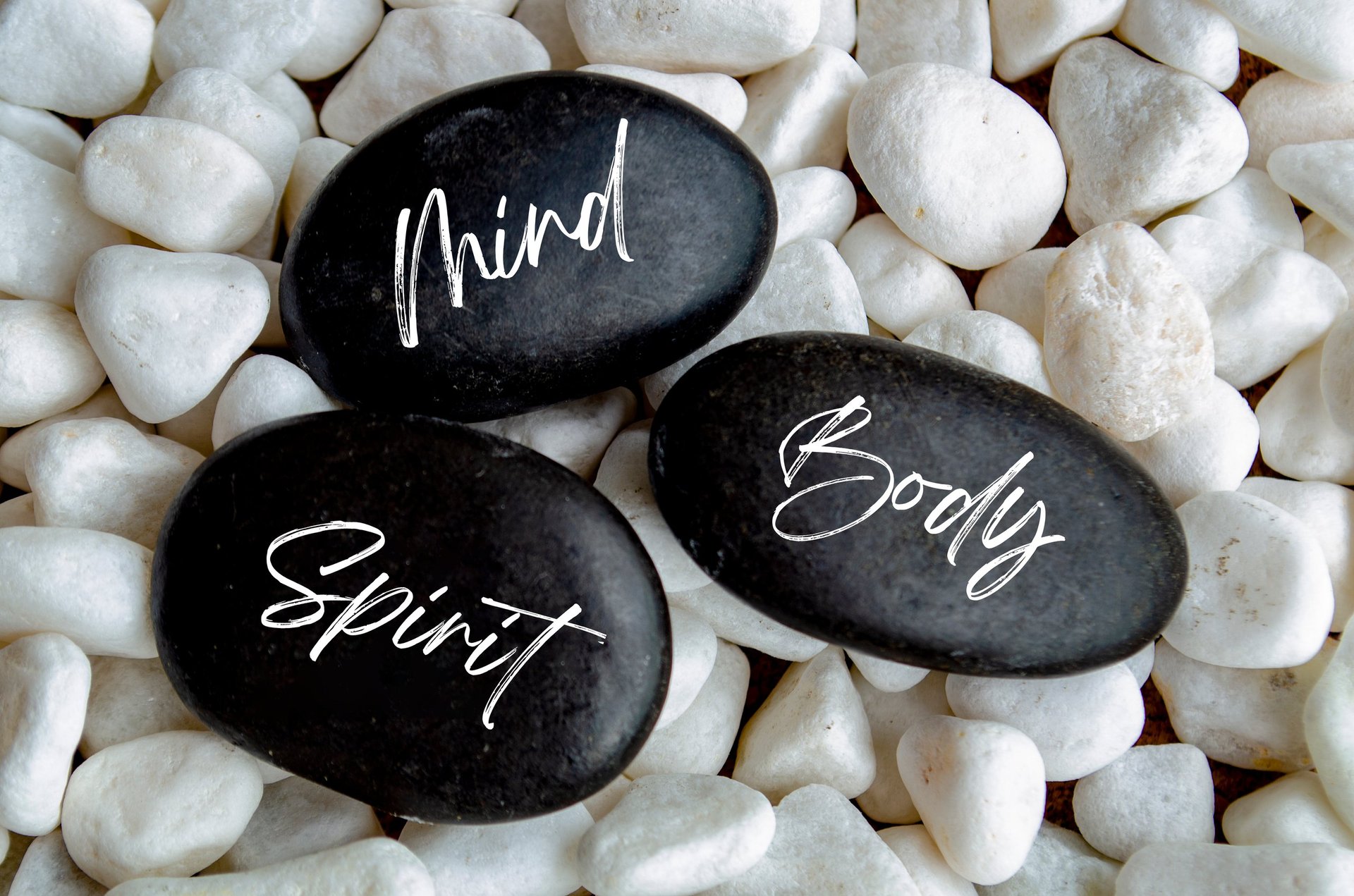 Zen stones with mind body spirit text