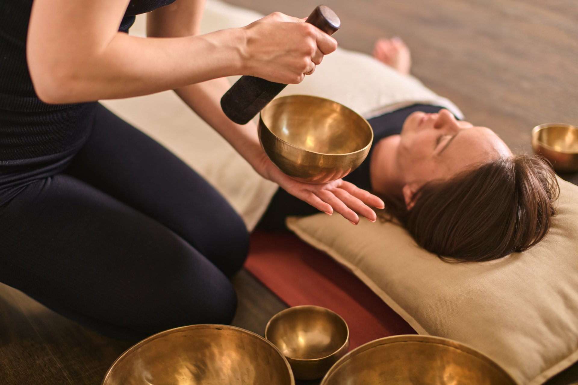 Sound therapy session with singing bowls